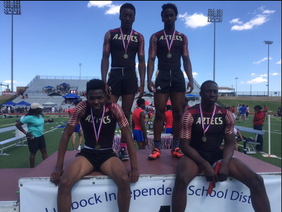 Track Relay Team Breaks Record