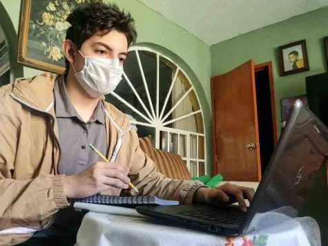 Junior Adrian Garcia attends class from home during the COVID-19 pandemic.