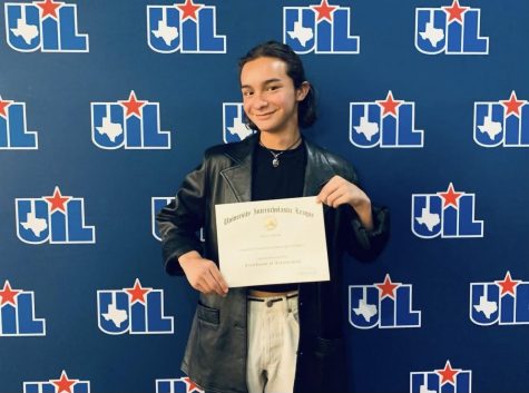 Senior Gael Araiza poses with his certificate of participation in the UIL State meet in Austin, Texas at the UT Austin campus on May 5. Araiza was the only SISD student to advance to the state UIL meet. He competed in headling writing, after winning first place at the regional competition.