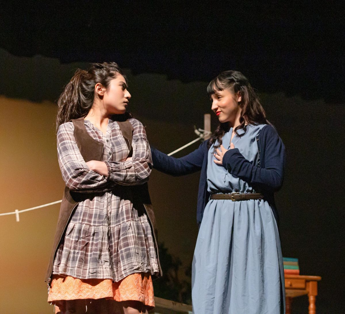 Pouting in character, freshman Maya Torres and senior Madeylnn Lopez perform a scene together on April 23 at the theater for the play, “And They Dance Real Slow In Jackson.” During Torres’s first year in the program, she experienced the first Area competition in the Xochiphilli Theater Company history. “It was really amazing to go to Lubbock during my first year. I loved the experience and now I know what to expect for next year,” Torres said.